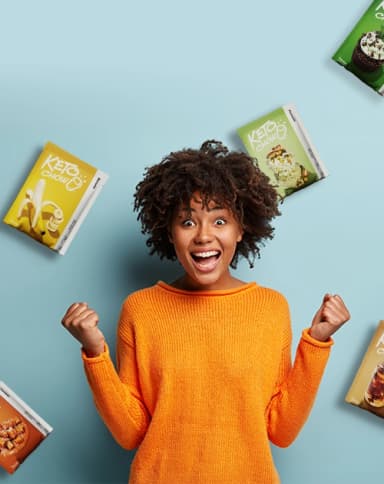an excited woman surrounded by Keto Chow