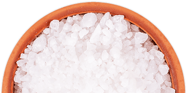 A bowl of salt on a gradient background