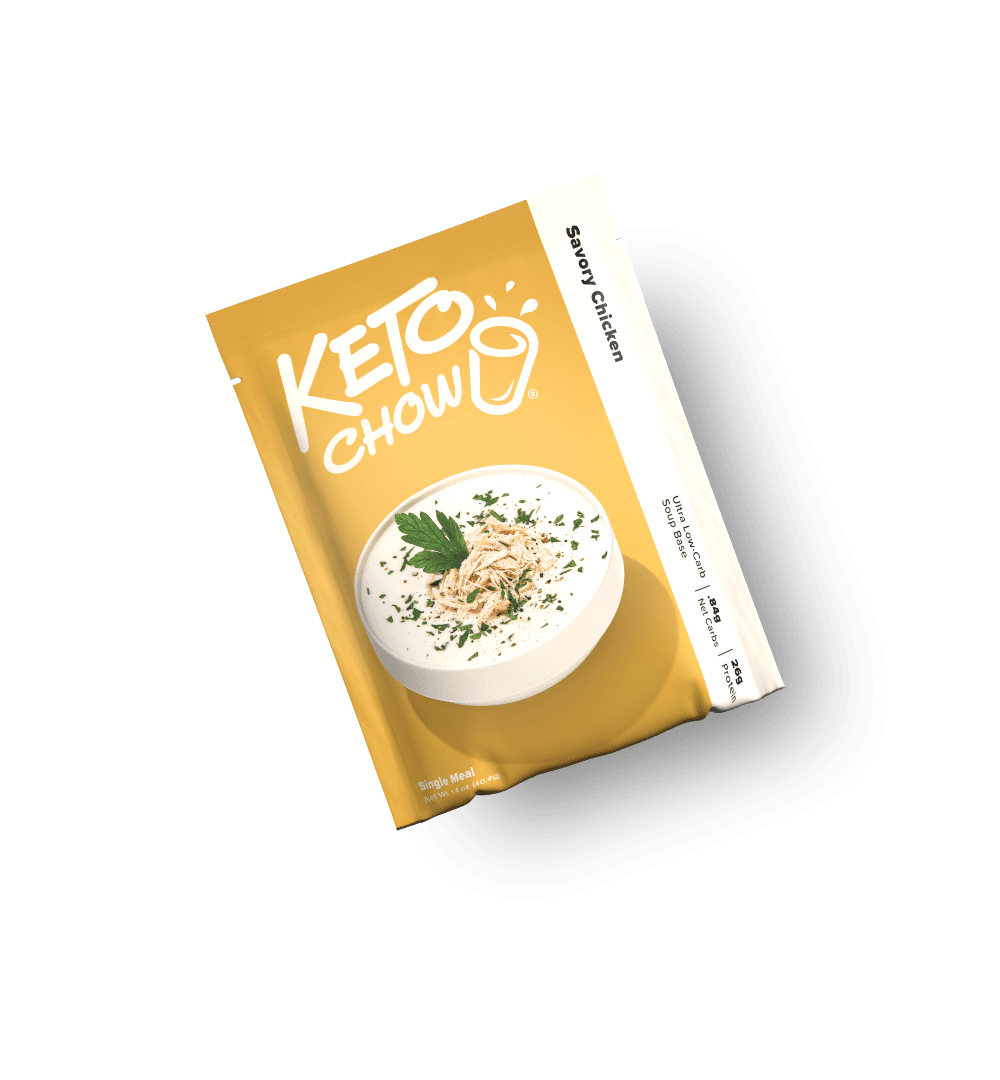 Keto Chow Savory Chicken yellow pouch. Features a bowl of soup with chicken and parsley. Visible text: Ultra Low-carb, 26g Protein.