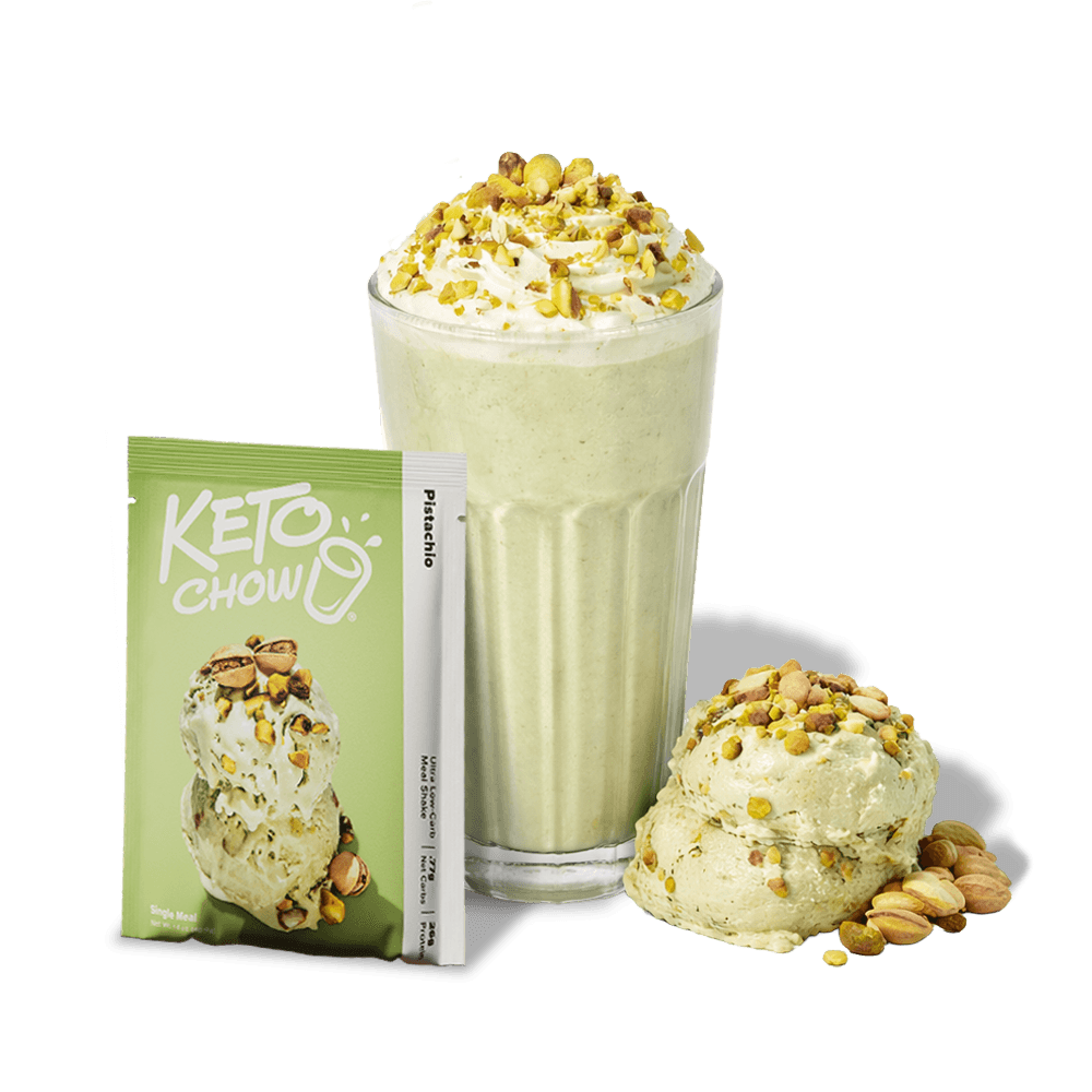 KETO CHOW Pistachio single meal shake packet (light green, Ultra Low-Carb text) presented with a pistachio shake in a glass and two scoops of pistachio ice cream, all topped with crushed pistachios.