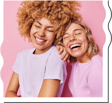 Two women laughing set on a pink background